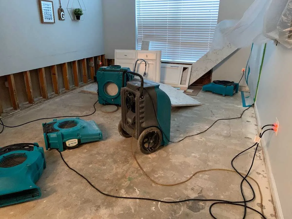 Dehumidifier in flood-cut room for Water Damage Restoration in Gainesville